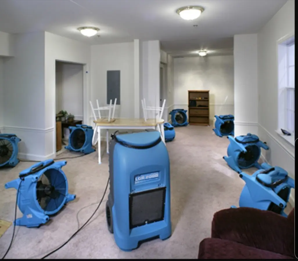 Air movers and dehumidifier setup for Water Damage Restoration in Templeton
